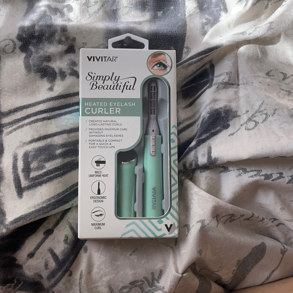 Heated eyelash curler